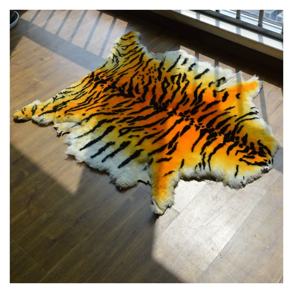 A tiger-patterned sheepskin rug is laid on a wooden floor