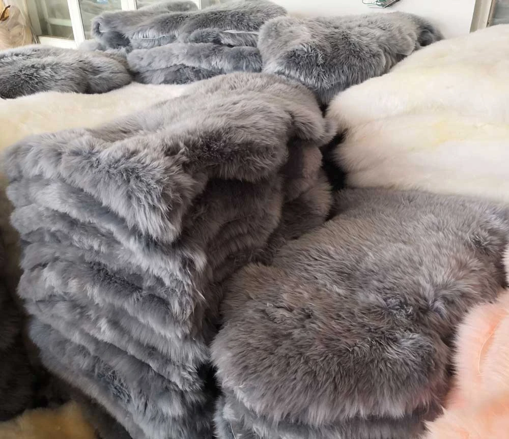 Sheepskin rugs stacked on top of each other