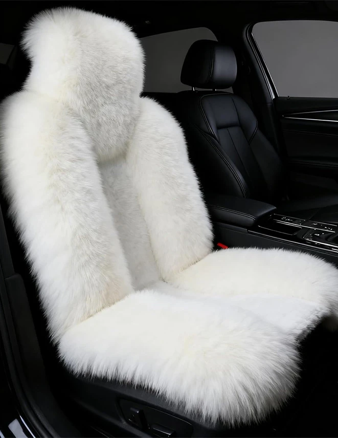 A white sheepskin car seat cover with long and low pile was placed on the passenger side of the car.
