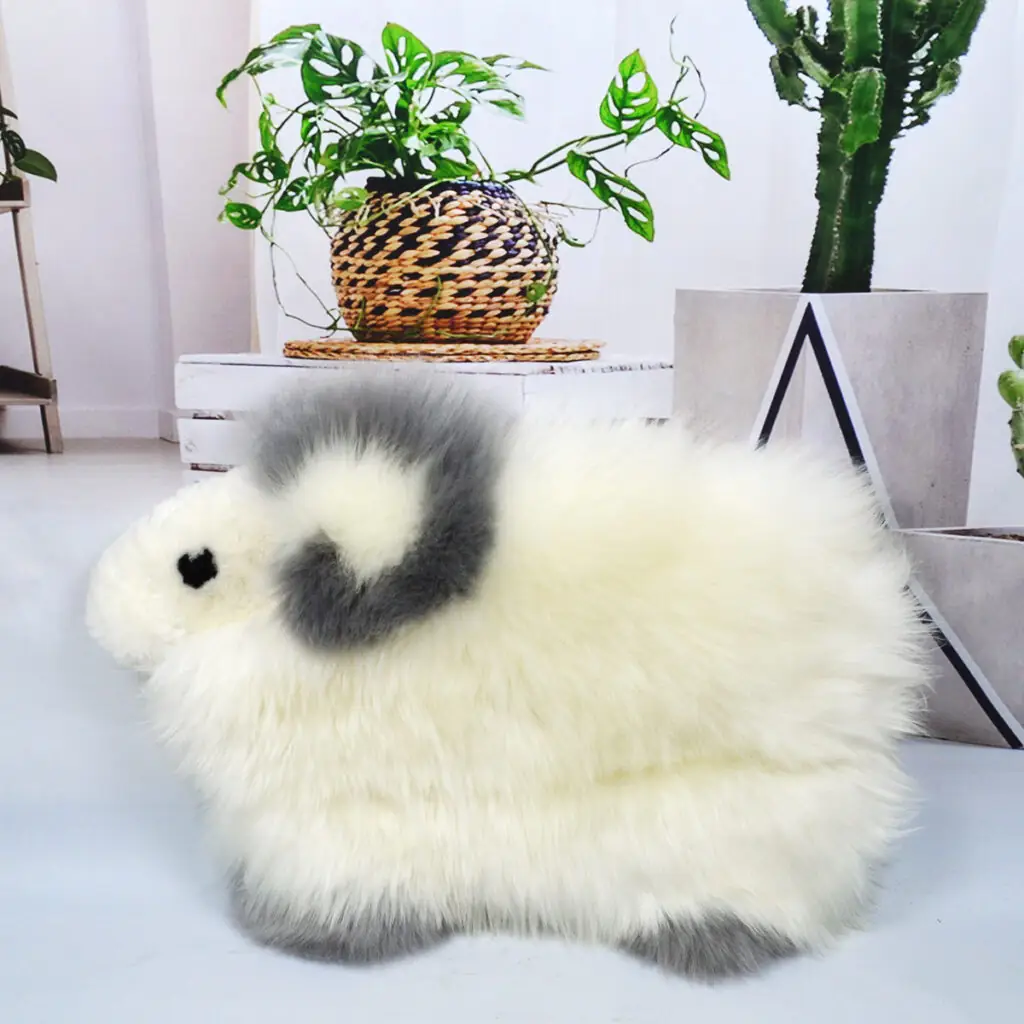 Home 46 A lamb-shaped sheepskin cushion